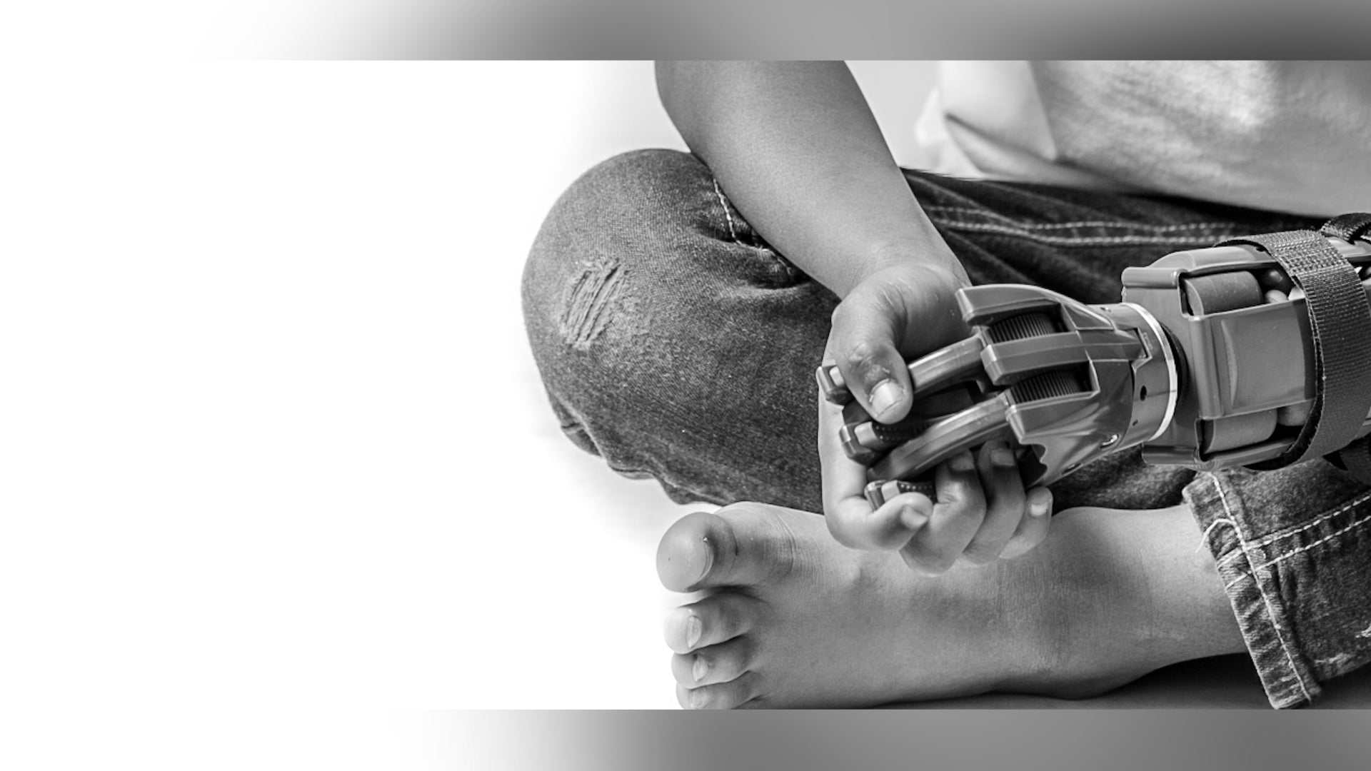 Corporate team building activity with employees assembling a prosthetic hand in the Bay Area