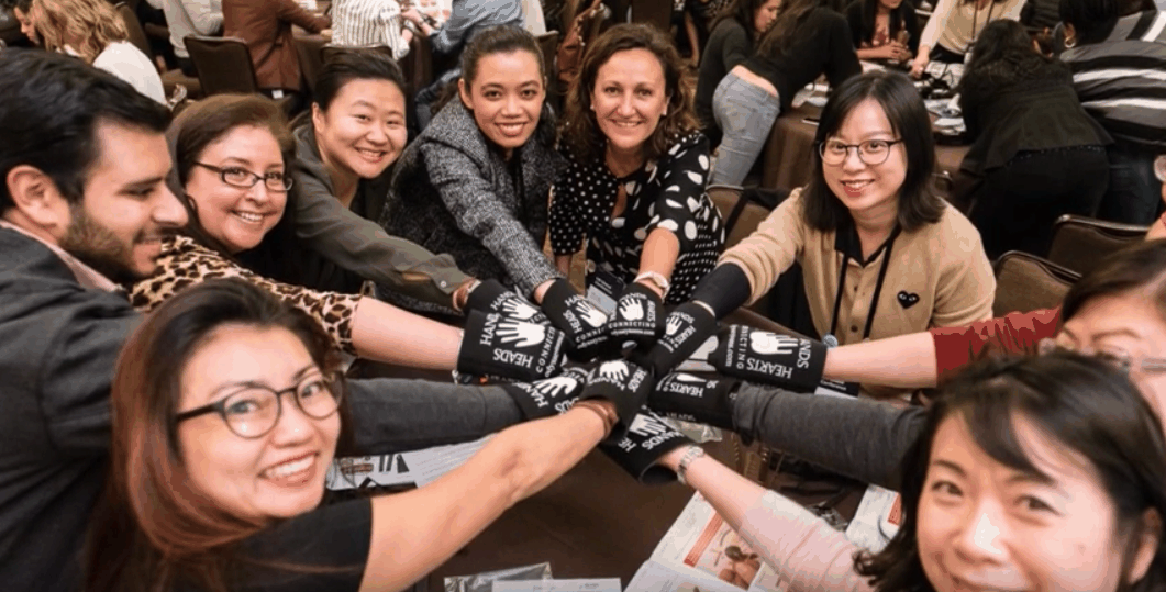 Microsoft HR professionals participating in Odyssey Teams' CSR Build-a-Hand team building at HR Global Conference
